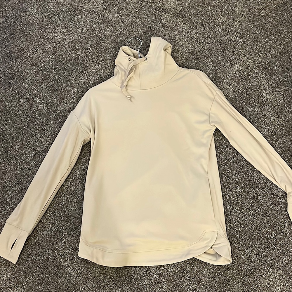 Flexible, light weight, soft long sleeve turtle neck style workout long sleeve.